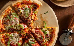 A plate with pizza slices.