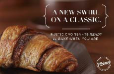 Image of a freshly baked chocolate swirl croissant. A new swirl on a classic. Rustic croissants ready to bake when you are.